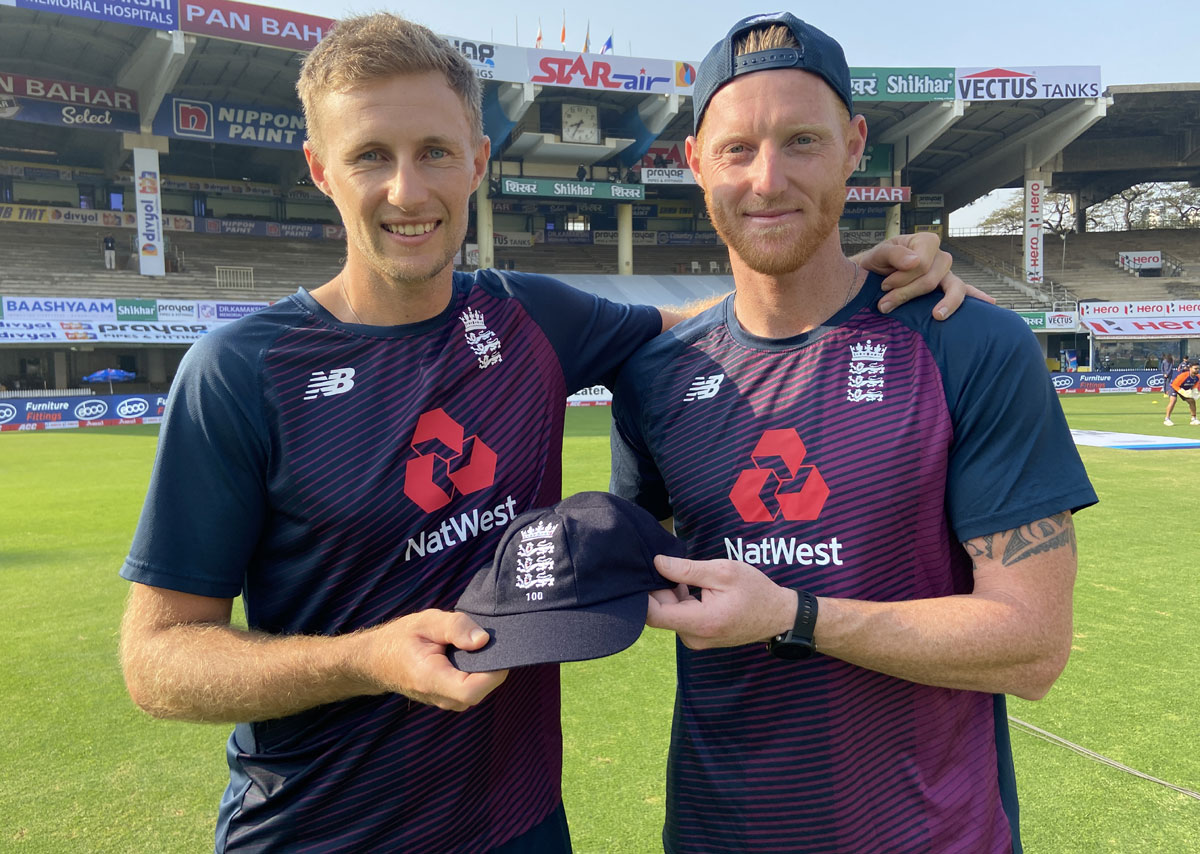 England captain Joe Root receives his 100th cap from Ben Stokes before the start of play on Day 1 of the first Test against India