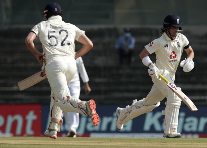 Rory Burns and Dom Sibley run between the wickets