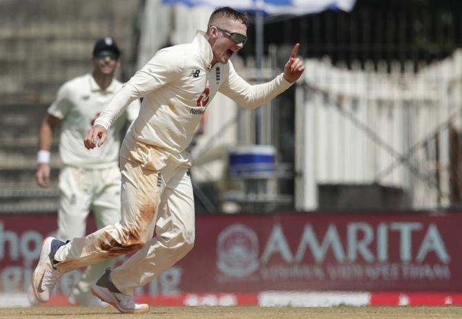 Dom Bess celebrates after dismissing Virat Kohli