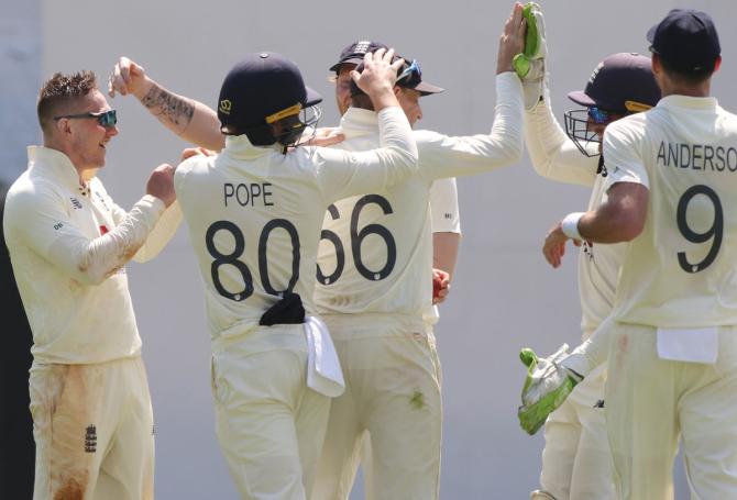 England's players celebrate after Dom Bess dismisses Ajinkya Rahane