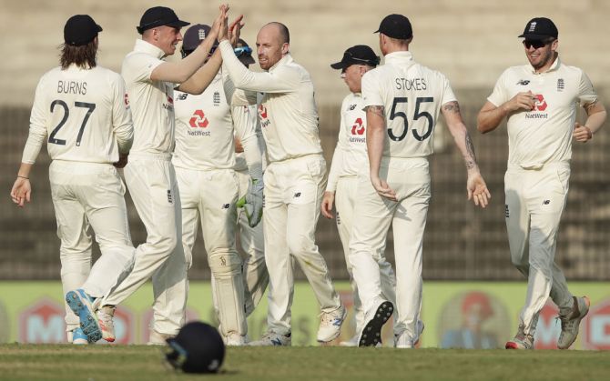 Jack Leach celebrates with teammates after dismissing Rohit Sharma 
