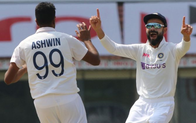 Ravichandran Ashwin celebrates the wicket of Rory Burns in England's second innings