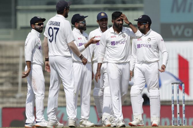 India players celebrate with Jasprit Bumrah after dismissing Joe Root.