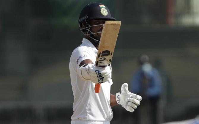 Washington Sundar celebrates after scoring a fifty during Day 4