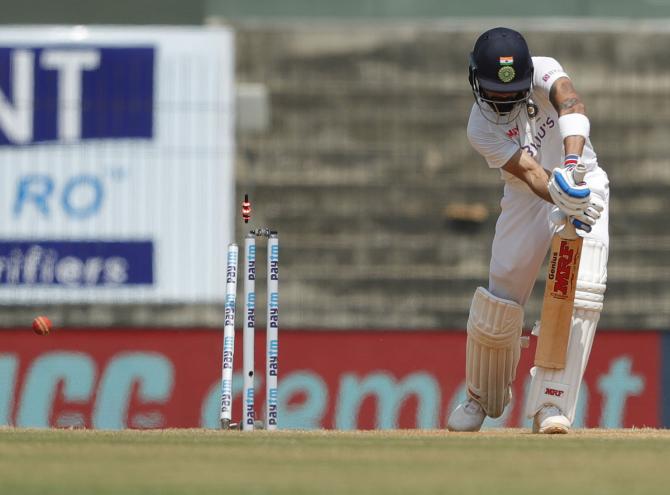 Virat Kohli is bowled by Ben Stokes