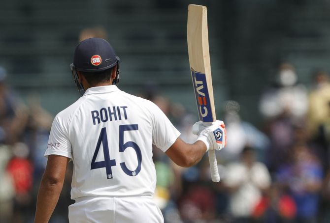 Rohit Sharma celebrates after scoring 50 during Day 1