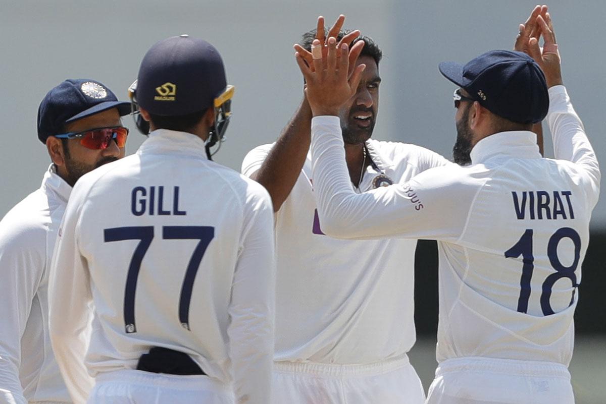 Ravichandran Ashwin is congratulated by skipper Virat Kohli after dismissing Ben Stokes