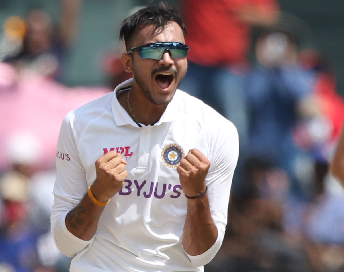 Axar Patel celebrates the wicket of England captain Joe Root on Day 2 of the second TestRoot