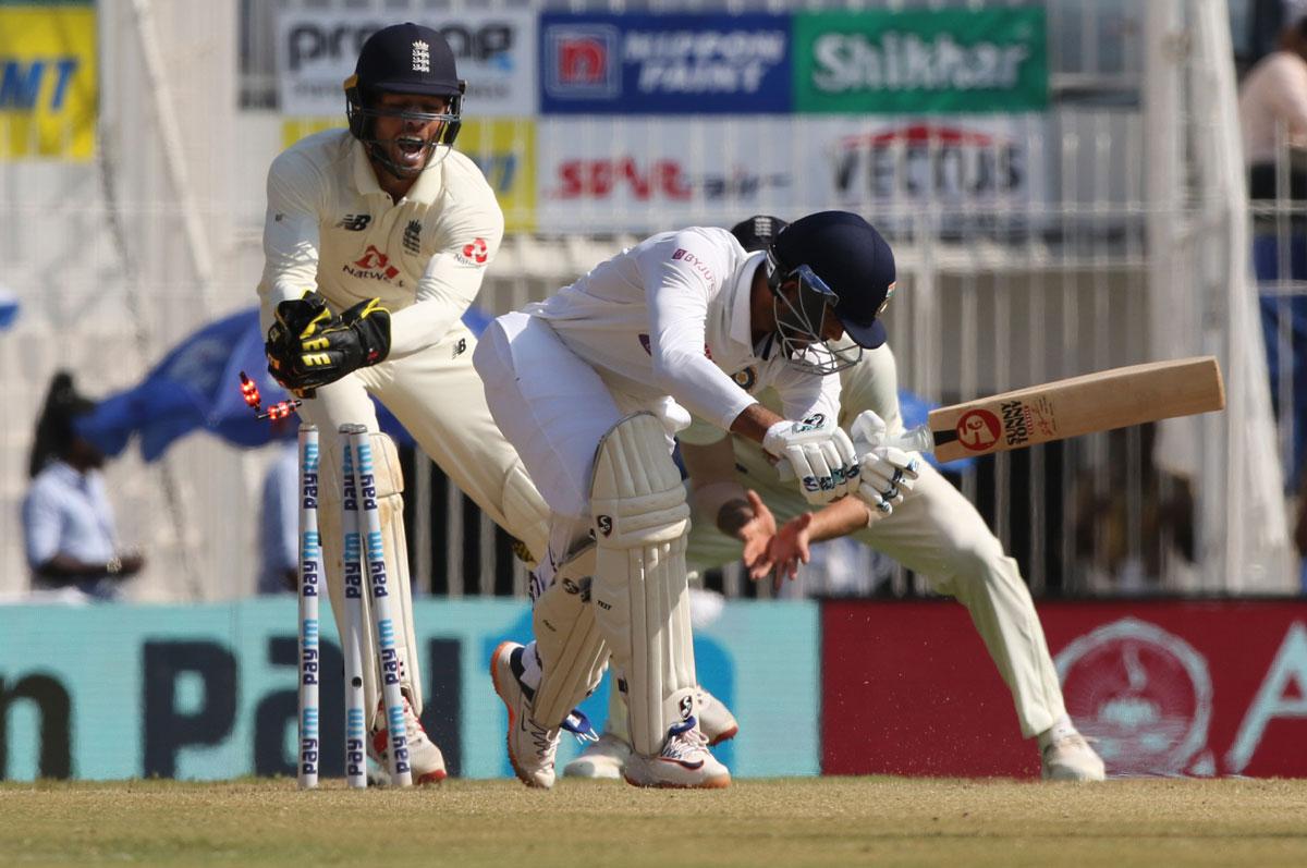 Axar Patel is stumped by Ben Foakes off Moeen Ali