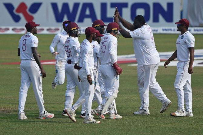 West Indies spinner Rahkeem Cornwall celebrates Bangladesh wicket on Sunday. He finished with a match haul of nine wickets, was adjudged man-of-the-match.
