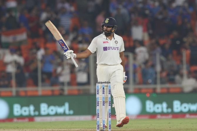 India opener Rohit Sharma celebrates his fifty on Wednesday, Day 1 of the third Test against England, at the Narendra Modi stadium, in Ahmedabad.