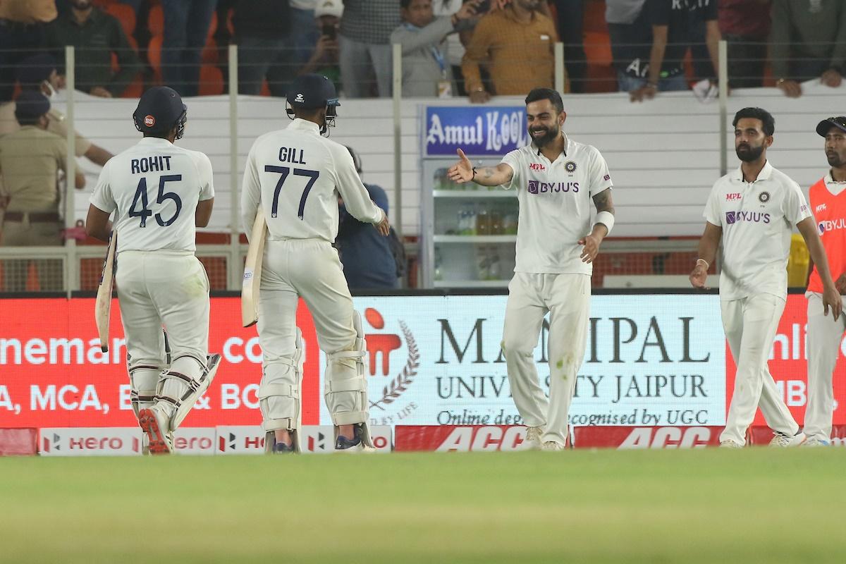 India's skipper Virat Kohli celebrates with opener Rohit Sharma and Shubman Gill after victory over England in the third Test