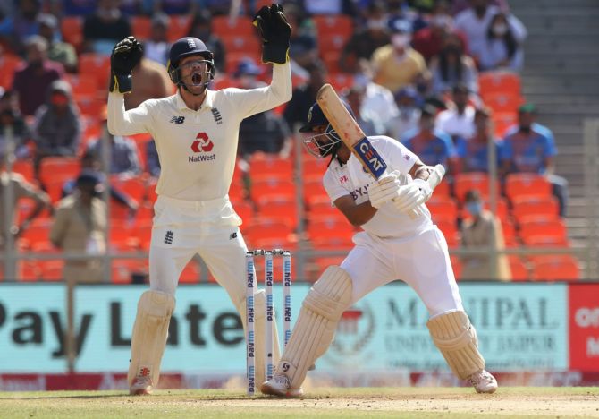 Ben Foakes appeals for the wicket of Ajinkya Rahane, who was given out LBW against Jack Leach