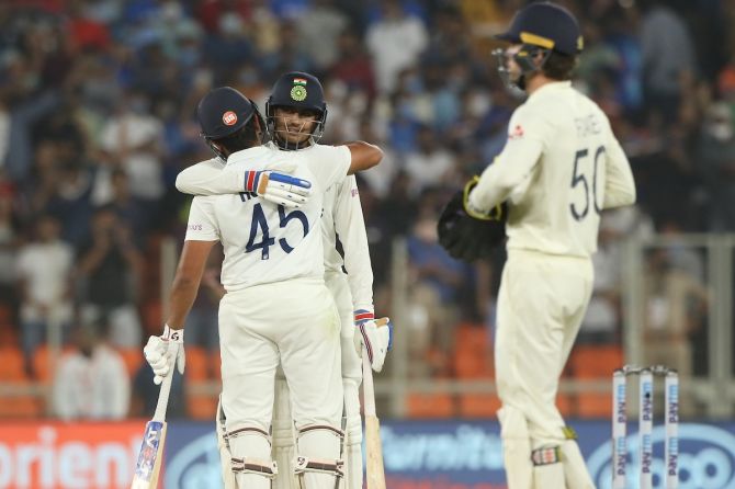 : India openers Rohit Sharma and Shubman Gill celebrate victory over England on Thursday, Day 2 of the third Test