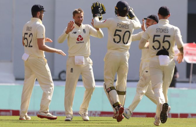 Joe Root celebrates the wicket of Axar Patel