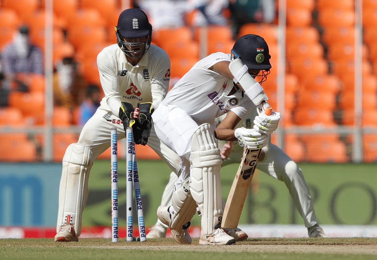 Washington Sundar is bowled by Joe Root