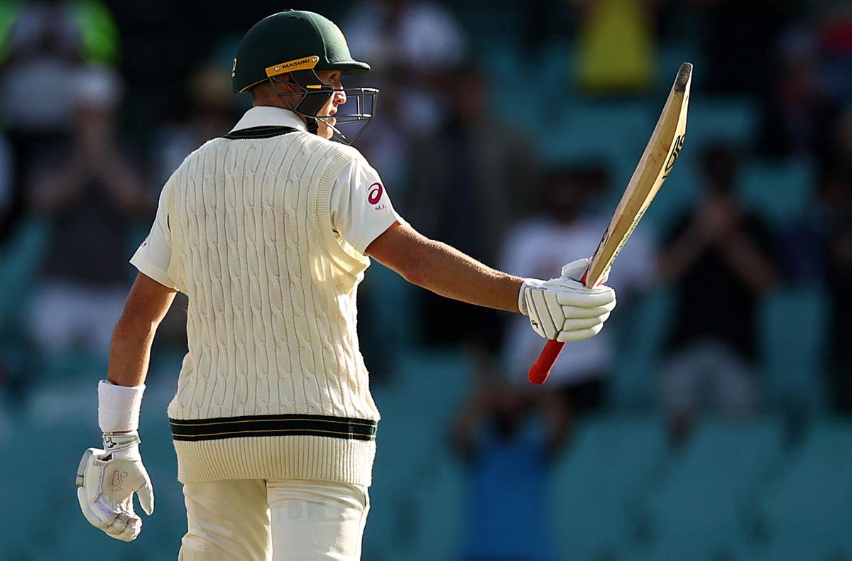 Marnus Labuschagne celebrates after completing his half century.