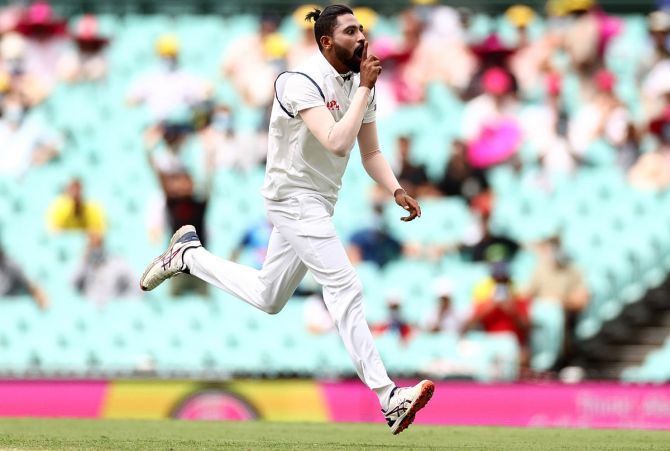 India pacer Mohammed Siraj celebrates after taking the wicket of Australia opener David Warner during Day 1 of the third Test, at the Sydney Cricket Ground