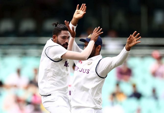 Mohammed Siraj celebrates after taking the wicket of David Warner on Day 1 of the 3rd Test match at Sydney Cricket Ground Sydney on Thursday.