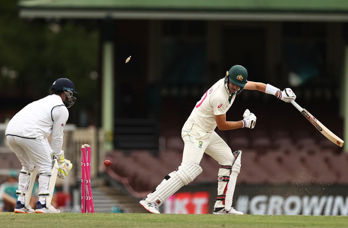 Pat Cummins is bowled by Ravindra Jadeja.