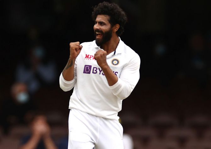 Ravindra Jadeja celebrates after taking the wicket of Matthew Wade