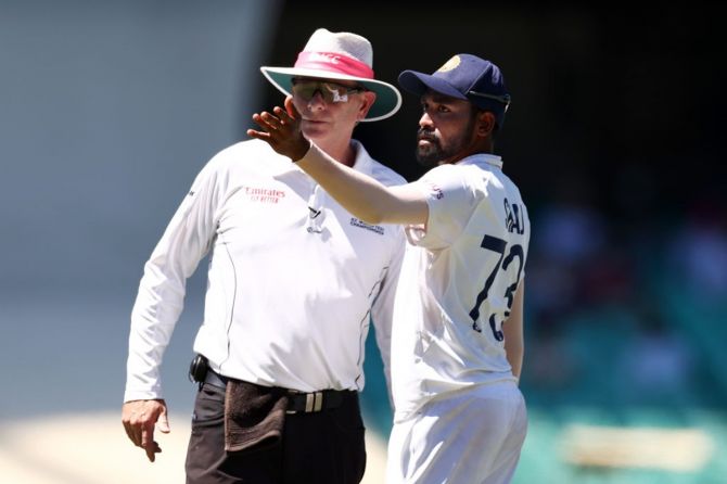 India's Mohammed Siraj halts play to make a formal complaint about some spectators in the bay behind his fielding position directing abuse at him during Day 4 of the third Test against Australia, at the Sydney Cricket Ground, on Sunday.