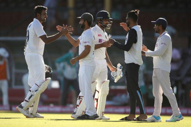 Ravichandran Ashwin and Ajinkya Rahane are all smiles after the draw on Day 5 of the 3rd Test at the SCG