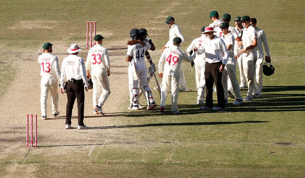 Ravichandran Ashwin and Hanuma Vihari embrace at the end of the match as India force a memorable draw in the third Test against Australia, at the Sydney Cricket Ground, on Monday.