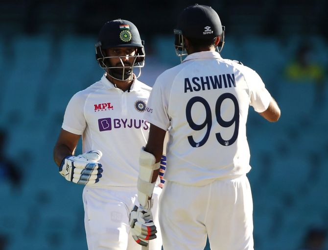 Hanuma Vihari and Ravichandran Ashwin during their gritty 62-run partnership in 42.4 overs on Day 5 of the third Test against Australia, at the Sydney Cricket Ground, on Monday.