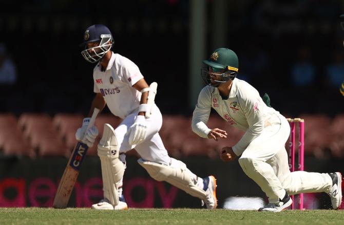 Matthew Wade takes the catch to dismiss Ajinkya Rahane.