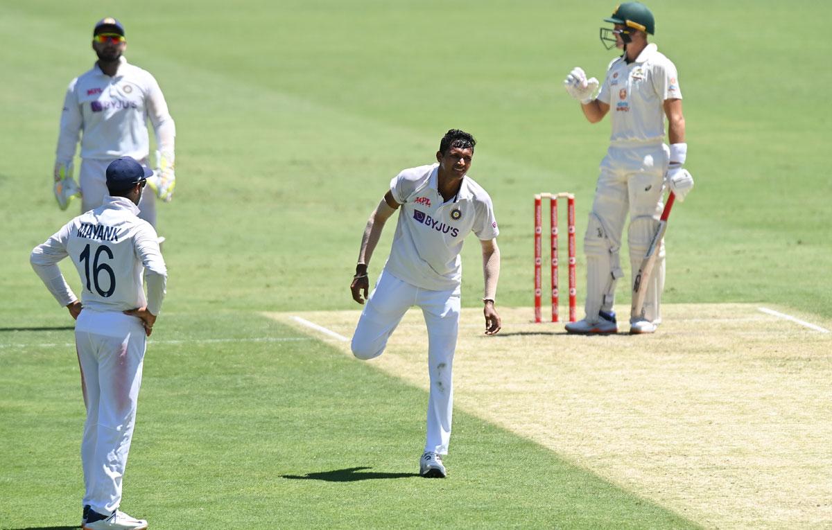 India pacer Navdeep Saini grimaces after sending down a delivery