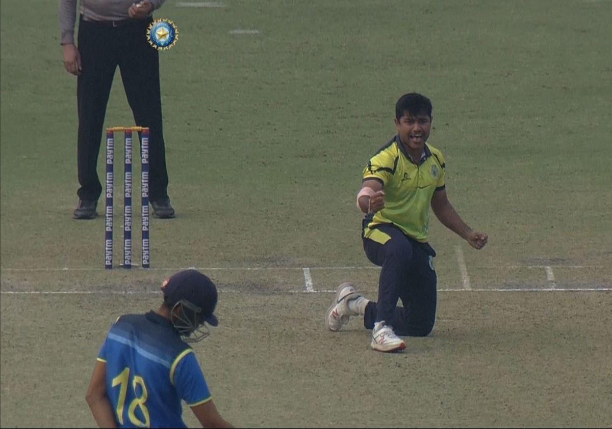 Assam's Pritam Das celebrates after taking a Bengal wicket on Saturday