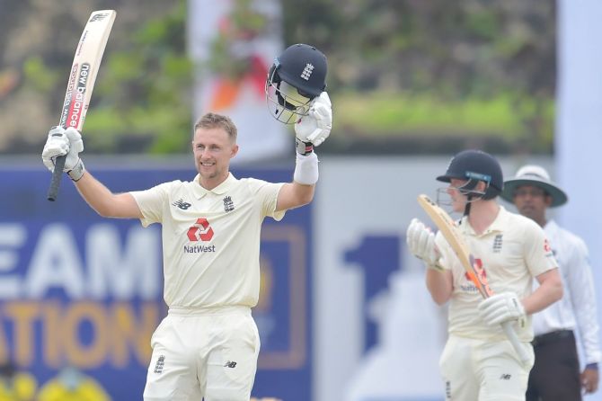 England's Joe Root celebrates on completing his double hundred on Day 2 of the 1st Test against Sri Lanka at Galle on Saturday
