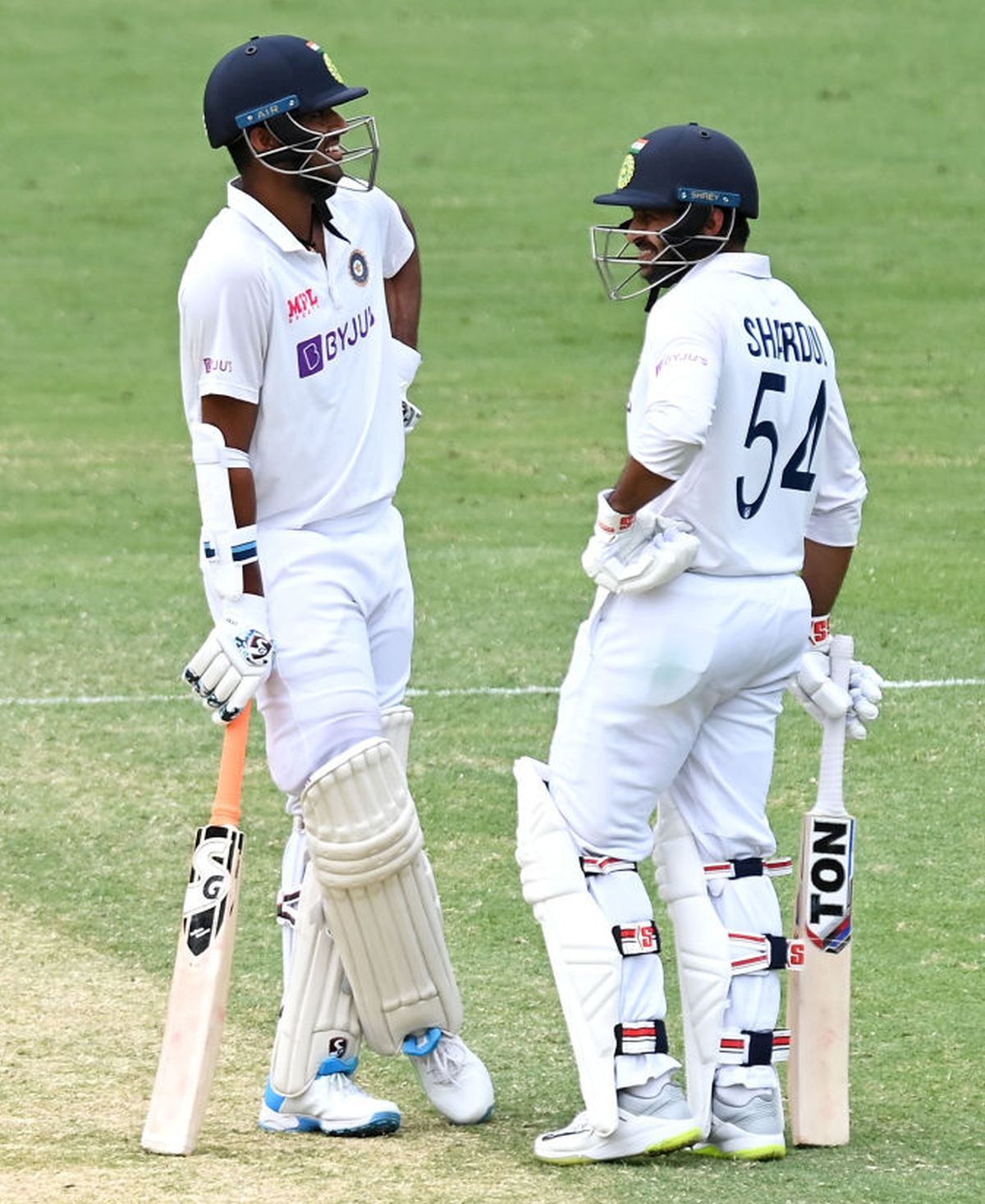 Washington Sundar and Shardul Thakur have something to smile about while amassing runs in their 123-run stand for the 7th wicket on Day 3 of the 4th Test in Gabba on Sunday