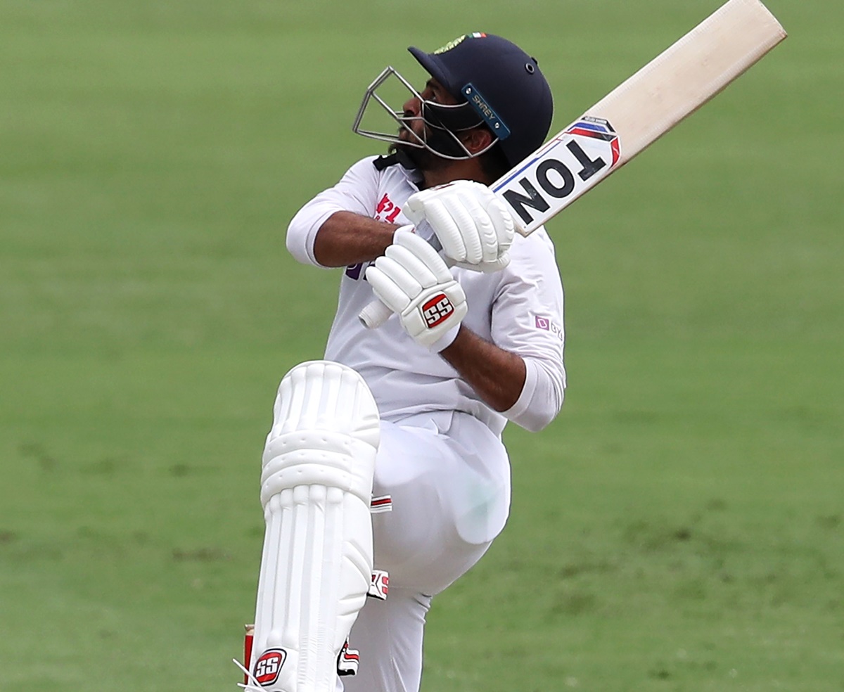 India's Shardul Thakur goes on one foot to send the ball to the fence after lunch on Day 3