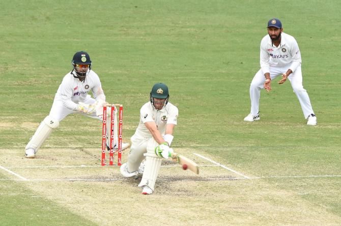 Tim Paine bats during Day 4.