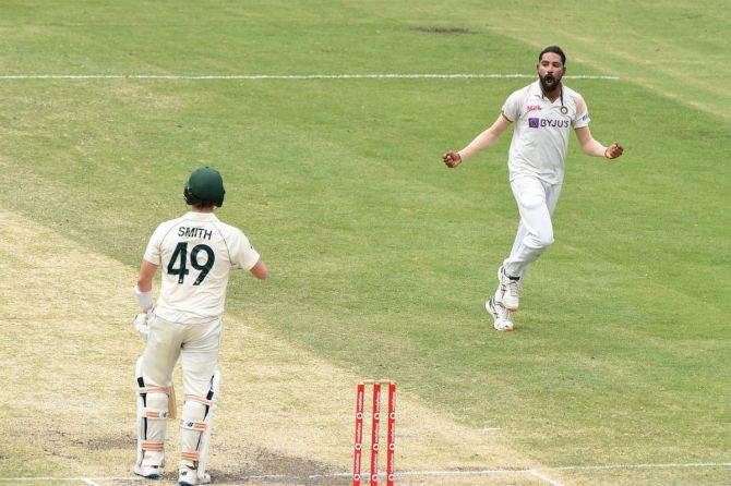 Mohammed Siraj celebrates on dismissing Steve Smith on Day 4 of the 4th Test at the Gabba in Brisbane on Monday