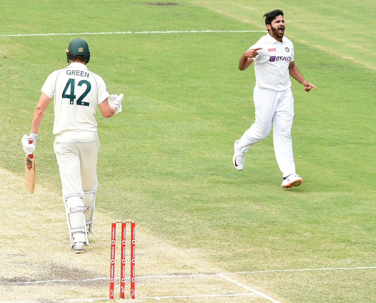 Shardul Thakur celebrates after dismissing Cameron Green on Day 4 of the fourth Test against Australia at the Gabba, in Brisbane, on Monday.