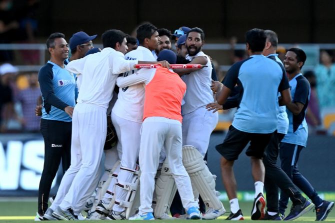 The Indian team celebrates victory over Australia on Day 5 of the fourth Test at the Gabba, in Brisbane,  on Tuesday.