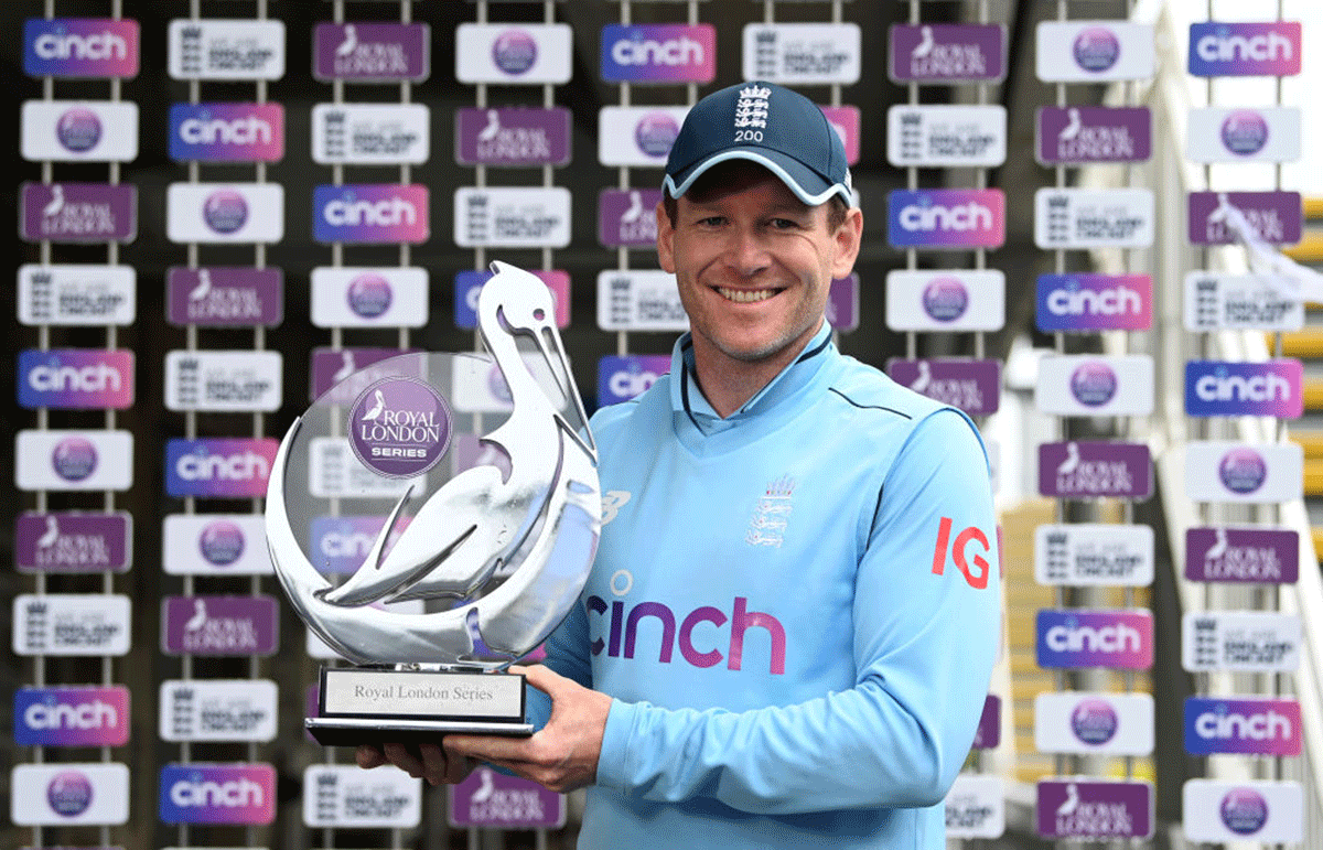 England captain Eoin Morgan holds up the trophy after winning the series against Sri Lanka 2-0 after the third One Day International at Bristol County Ground in Bristol was abandoned due to rain on Sunday