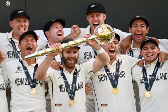 New Zealand’s players celebrate with the ICC World Test Championship mace after beating India by eight wickets in the final in Southampton on June 23