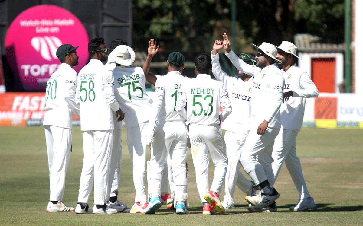 Bangladesh players celebrate after defeating Zimbabwe on the fifth day of the one-off Test at the Harare Sports Club on Sunday