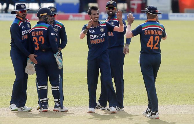 India's Yuzvendra Chahal celebrates with teammates after dismissing Sri Lanka's Avishka Fernando, caught by Manish Pandey, during the first ODI in Colombo, on Sunday.  