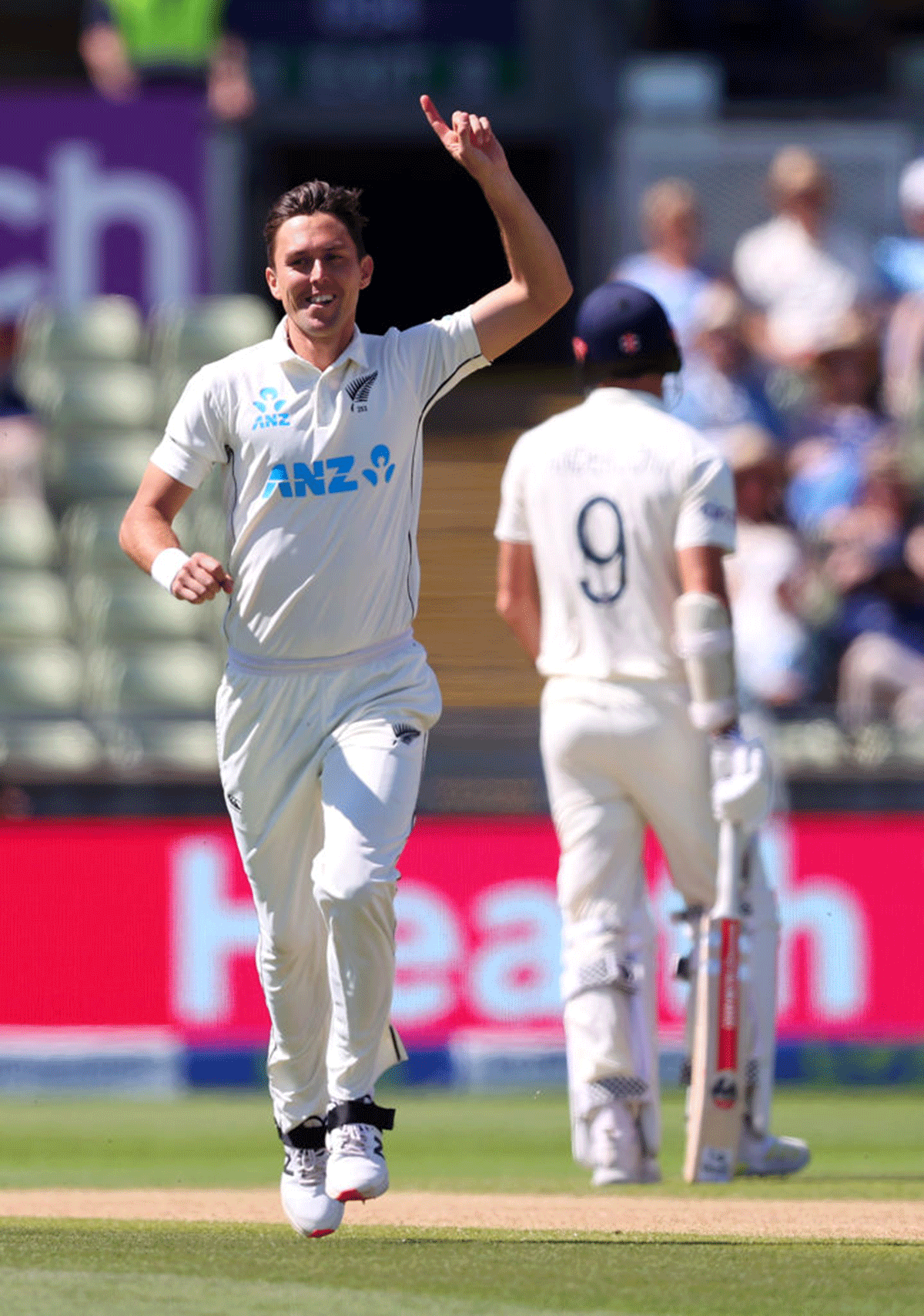 Trent Boult celebrates after taking the wicket of Olly Stone 