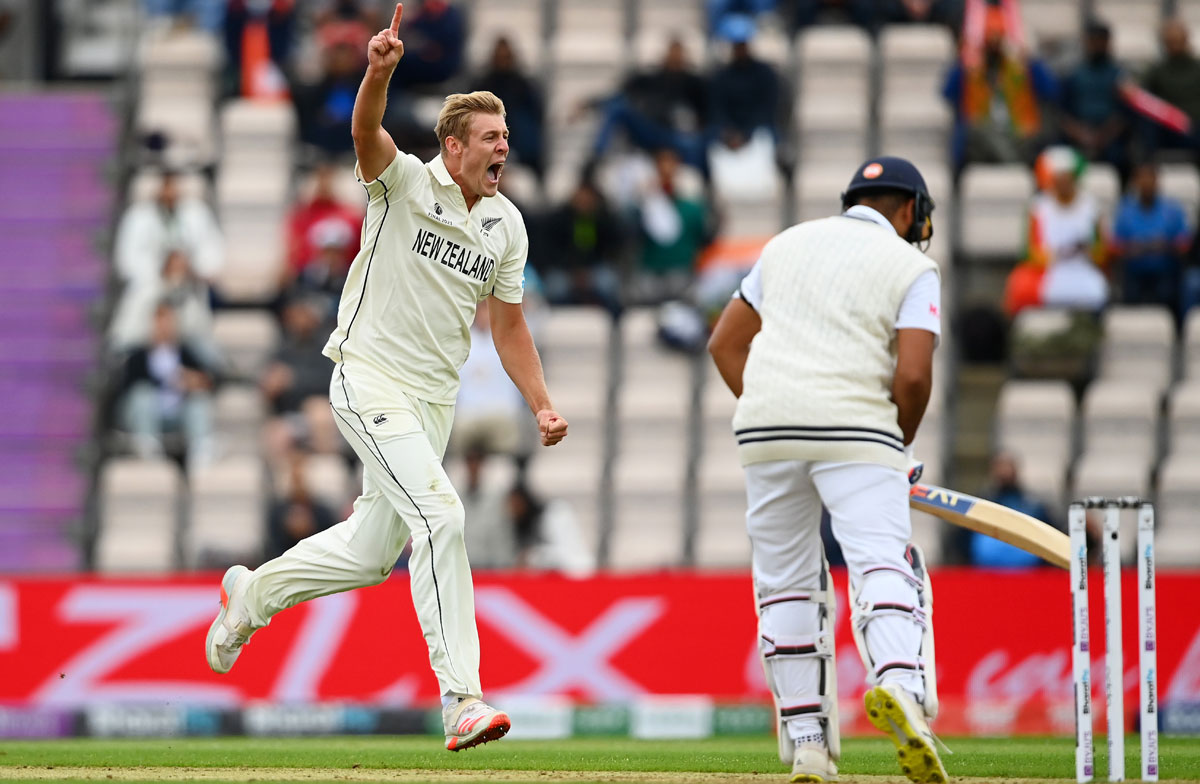 New Zealand pacer Kyle Jamieson celebrates dismissing Rohit Sharma