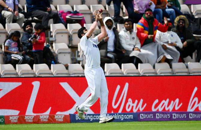 Jasprit Bumrah takes the catch to dismiss Kyle Jamieson