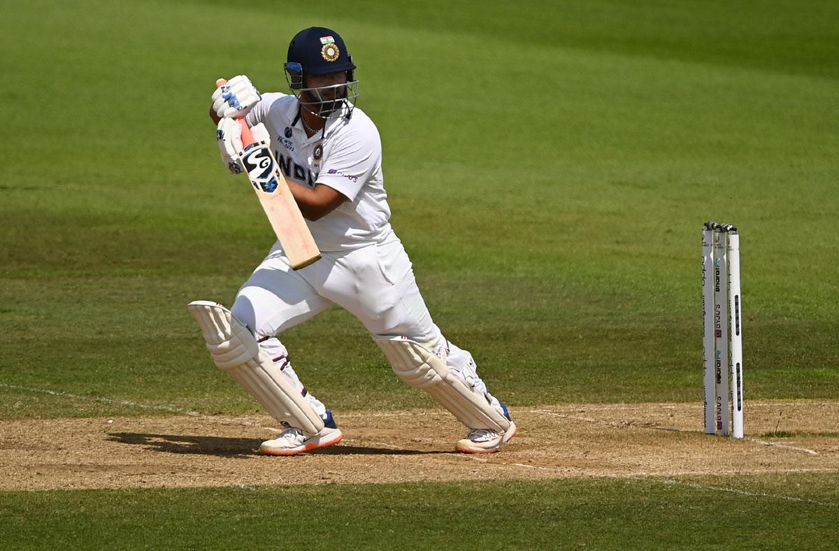 India's Rishabh Pant scores a four