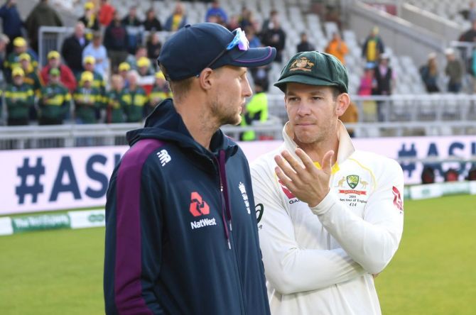 Australia Test captain Tim Paine speaks to England Test skipper Joe Root. An England win in Ahmedabad would put Australia in the final of the inaugural World Test Championship (WTC) against New Zealand, knocking India out of the running.