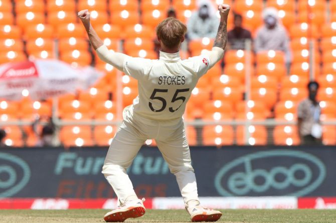 Ben Stokes celebrates the wicket of Rohit Sharma