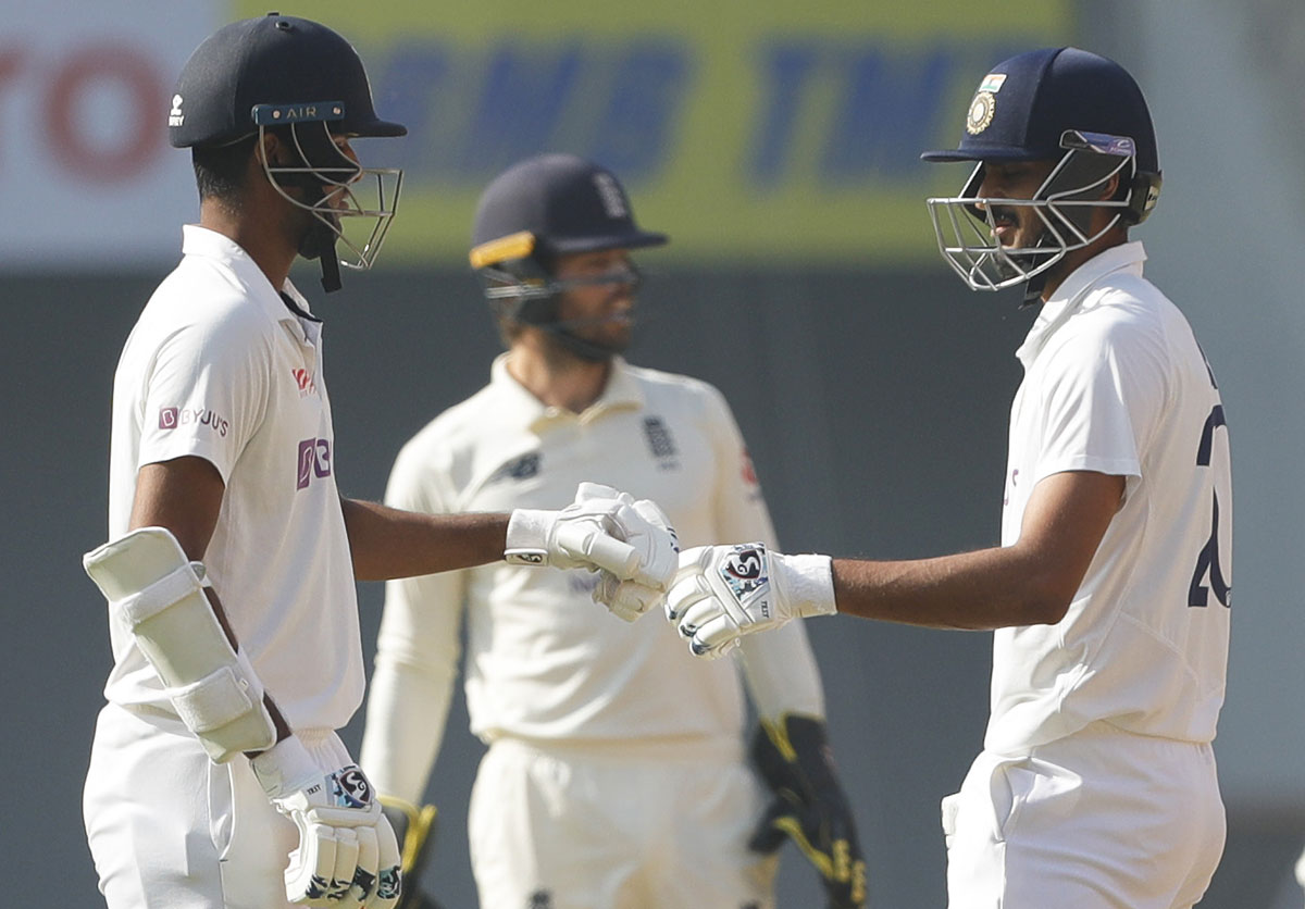 Axar Patel and Washington Sundar celebrate a boundary